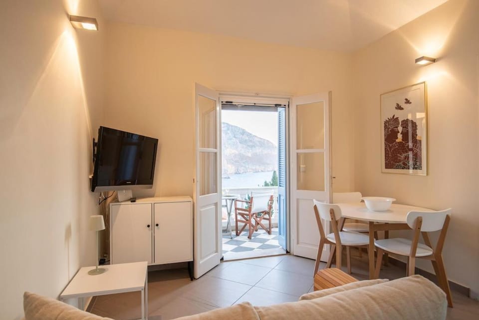 Day, TV and multimedia, View (from property/room), View (from property/room), Living room, Seating area, Dining area, Mountain view, Mountain view, Sea view, Sea view, Time of day