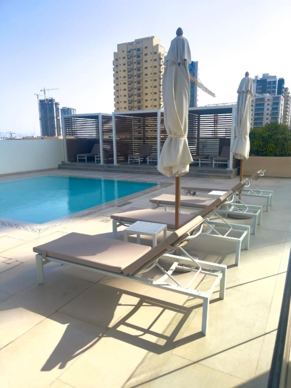 Property building, Patio, Day, Pool view, Swimming pool, sunbed
