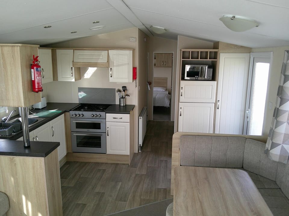Kitchen or kitchenette, oven, stove, toaster