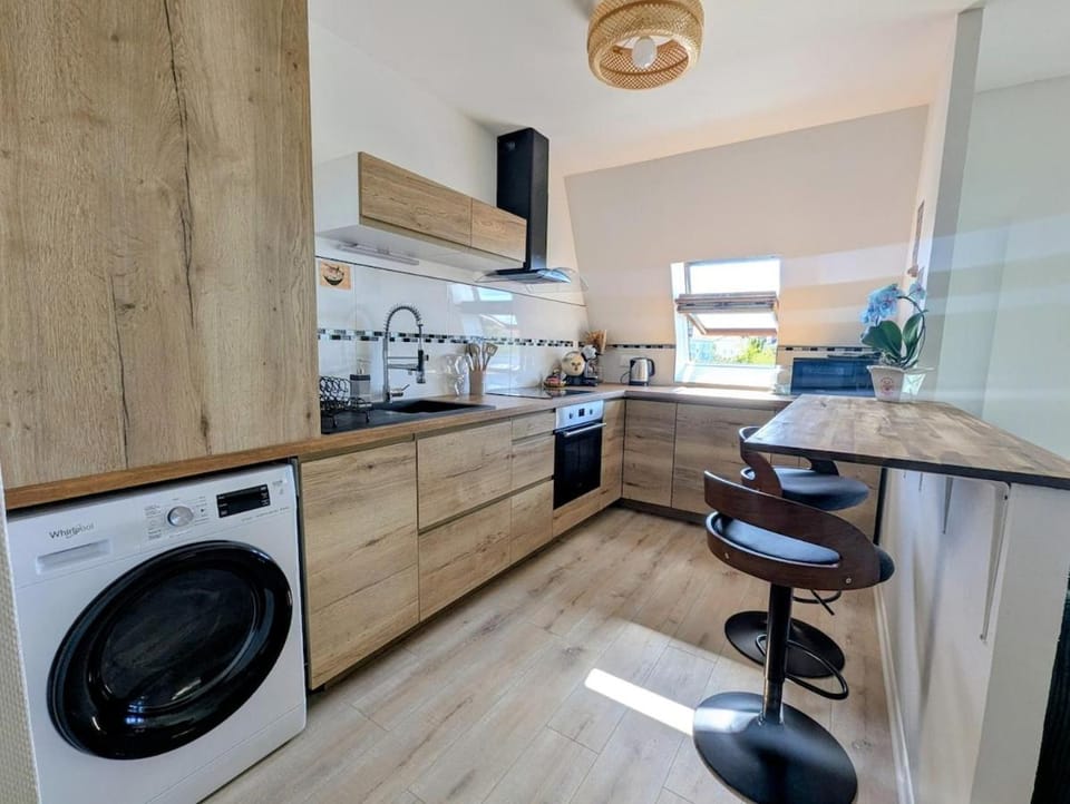 Kitchen or kitchenette, dishwasher, oven, stove, washing machine, dryer