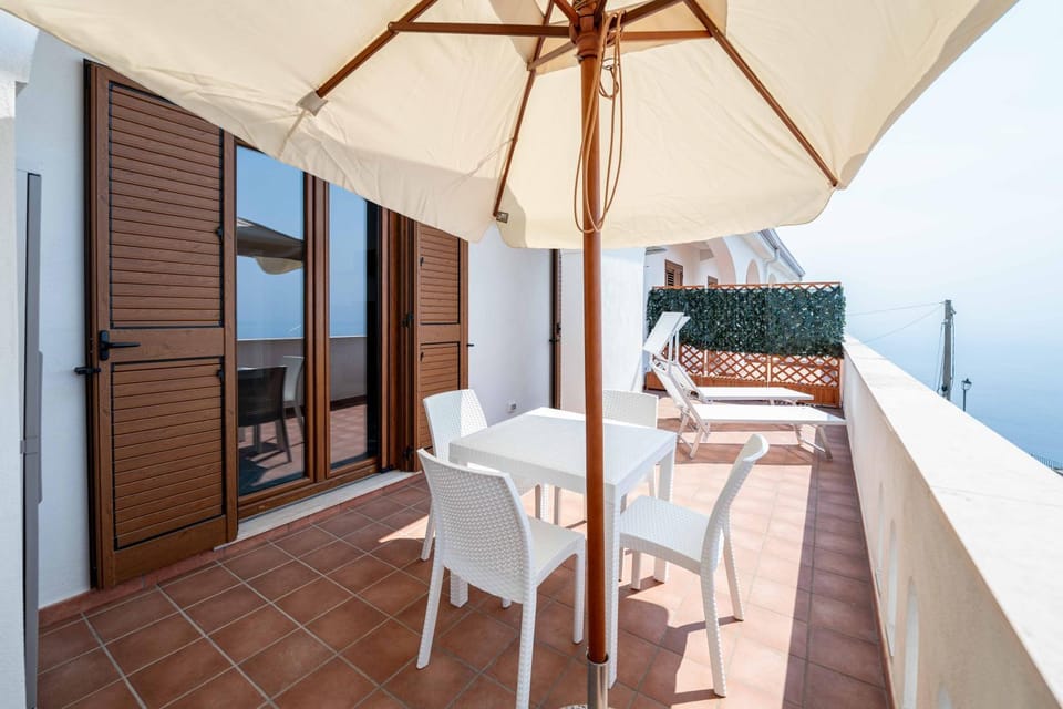 Patio, Natural landscape, View (from property/room), Balcony/Terrace, Seating area, Dining area, Sea view, sunbed