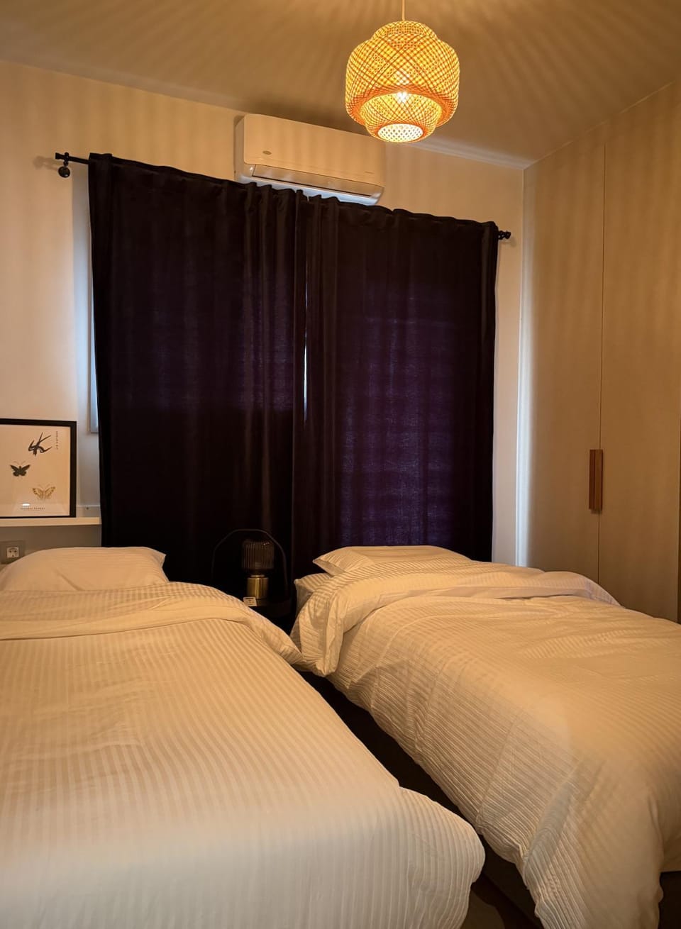 Bed, Bedroom, hair dryier, towels, air conditioner