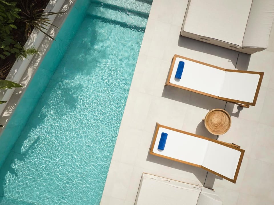 Swimming pool, sunbed