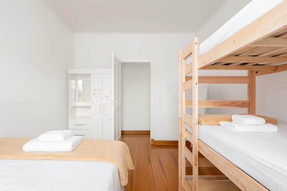 Bed, Photo of the whole room, Bedroom, bunk bed, towels, wardrobe