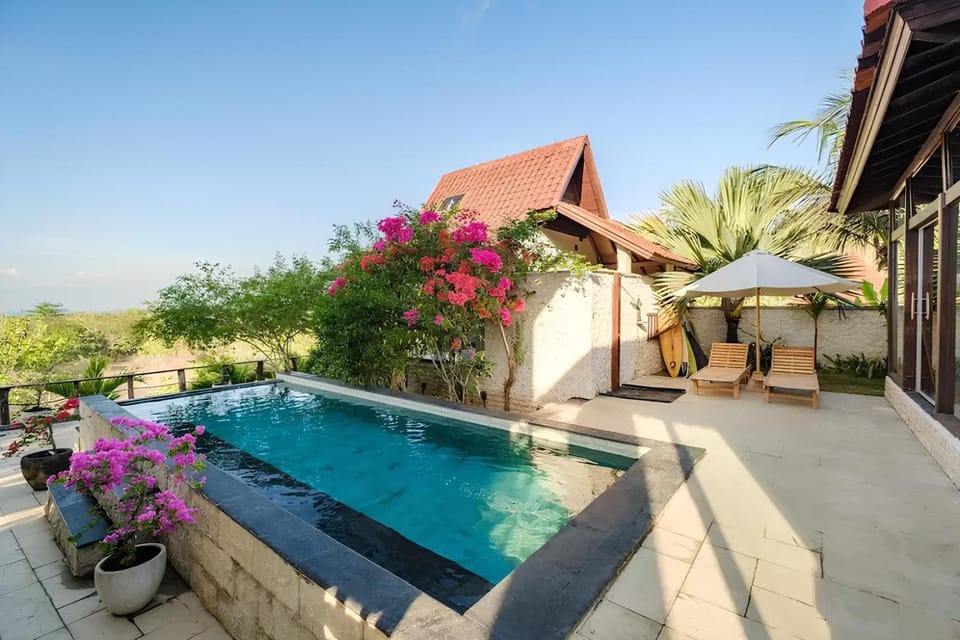 Property building, Day, Natural landscape, Pool view, Swimming pool