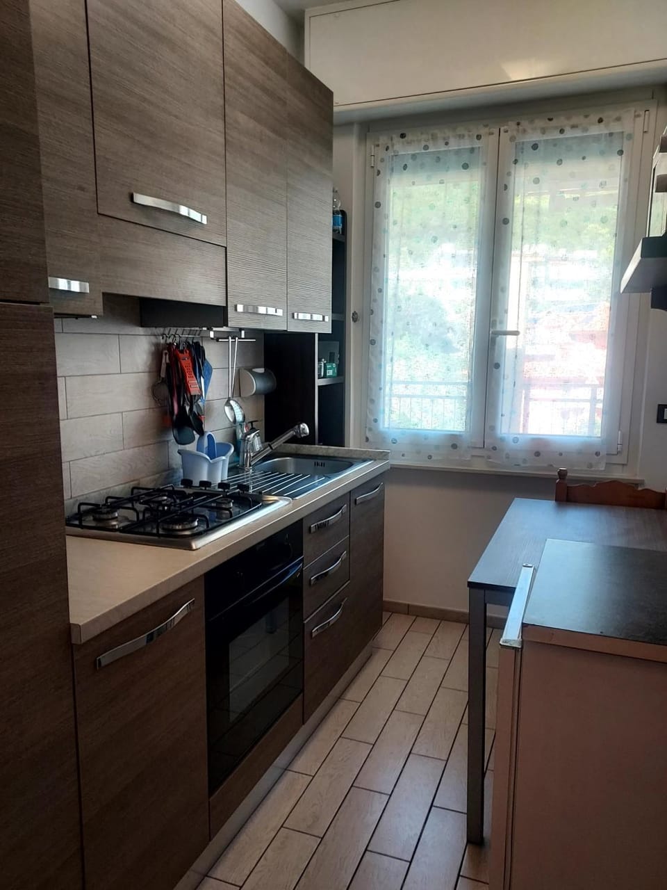 Kitchen or kitchenette, oven, stove