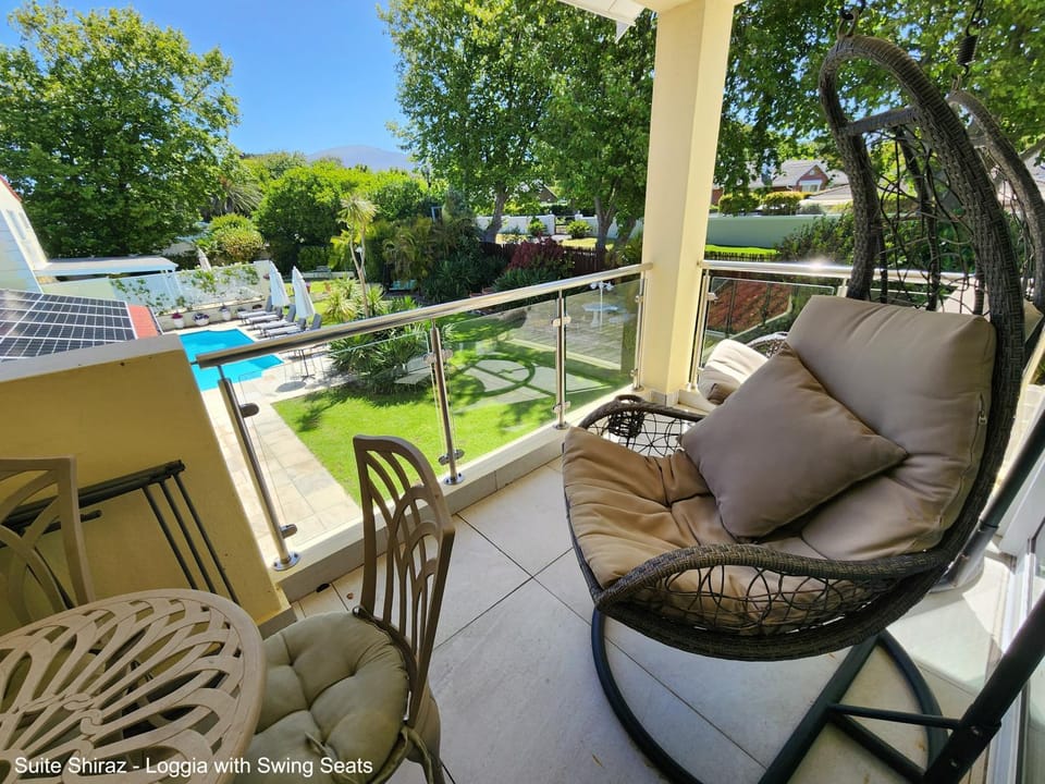View (from property/room), Balcony/Terrace, Seating area, Garden view, Pool view