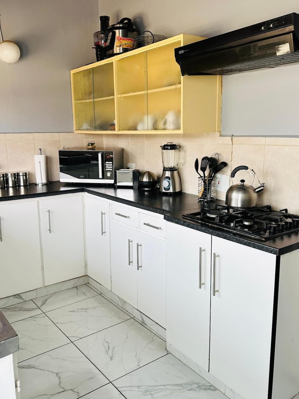Kitchen or kitchenette, stove, toaster