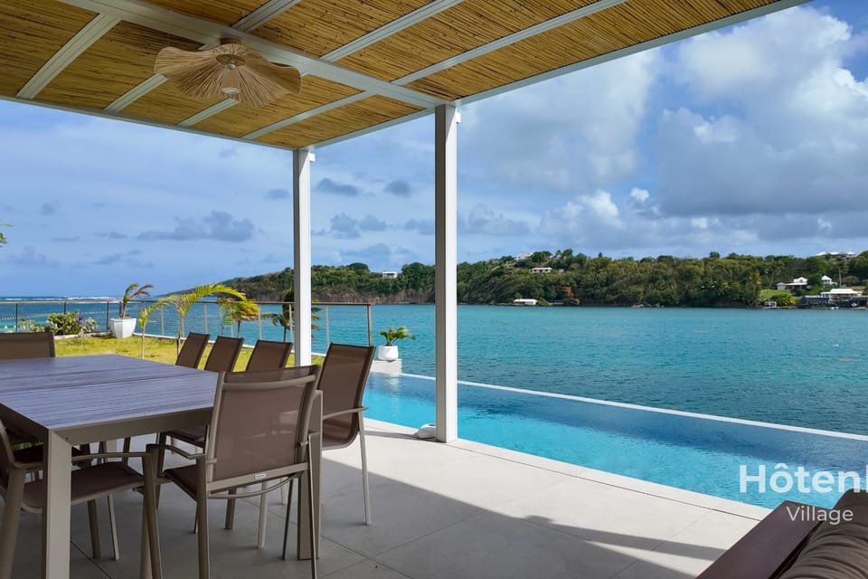 Patio, Day, View (from property/room), Dining area, Pool view, Sea view, Swimming pool, Swimming pool