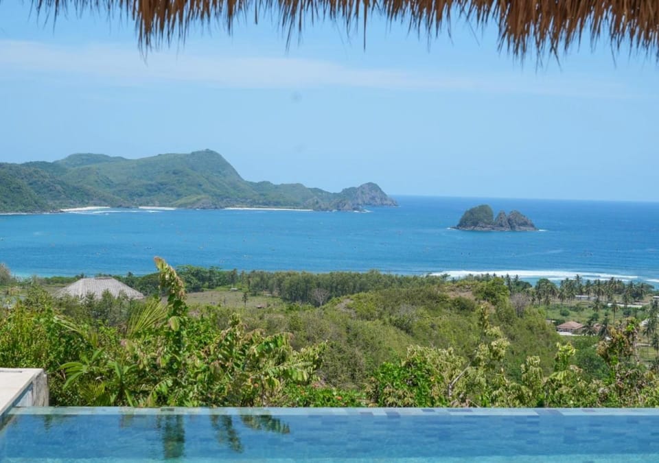 View (from property/room), Mountain view, Sea view, Swimming pool