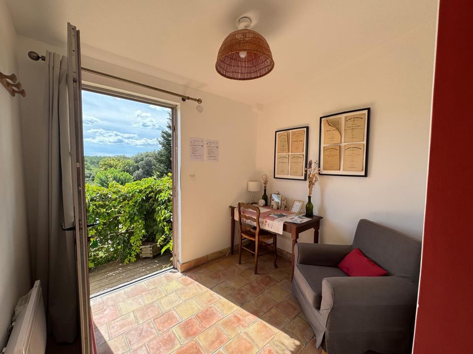 Natural landscape, View (from property/room), Living room, Seating area