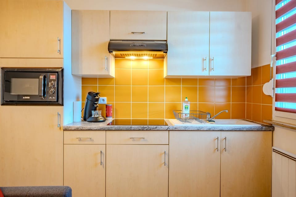 Kitchen or kitchenette, stove