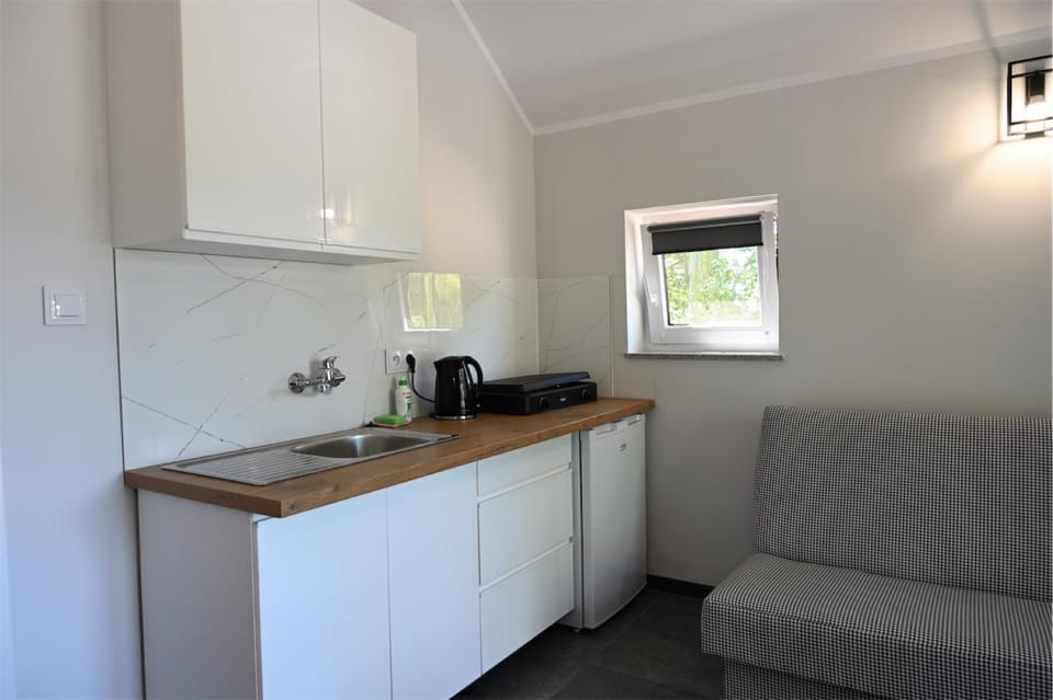 Kitchen or kitchenette, stove