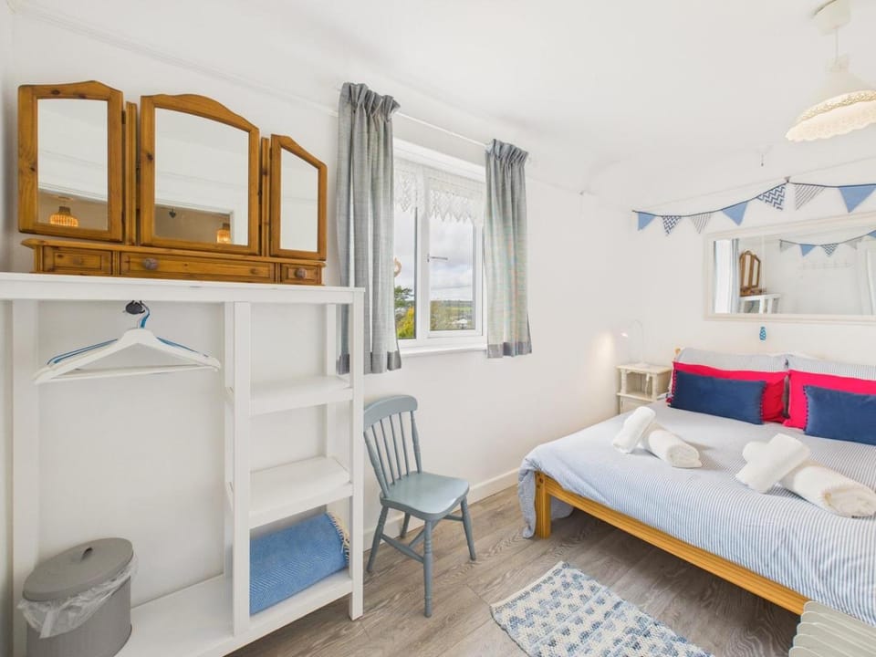 Bed, Bathroom, towels, wardrobe