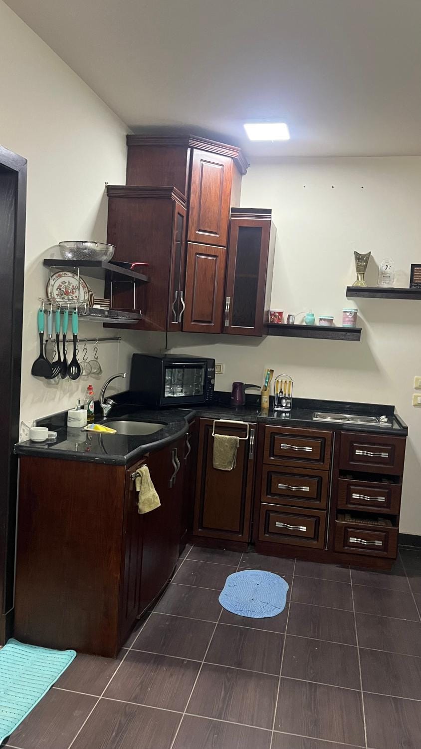 Kitchen or kitchenette, oven, stove
