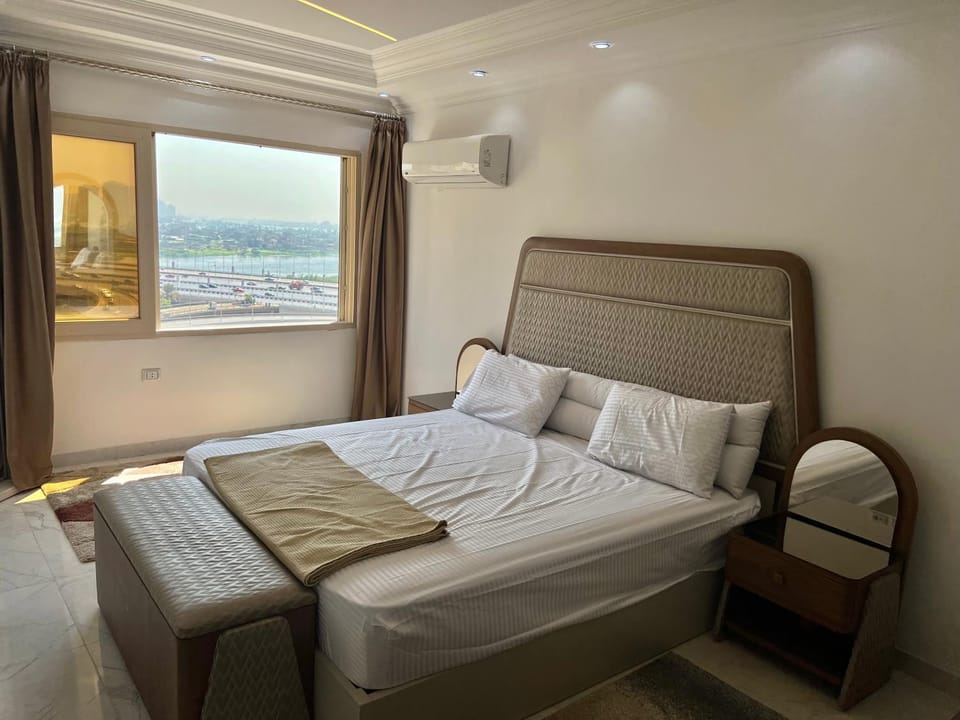 شقة فندقية بالبحر الاعظم كل الغرف مطله على النيل 3 غرف وحمامين ومطبخ ورسبشن Apartment in Cairo Governorate