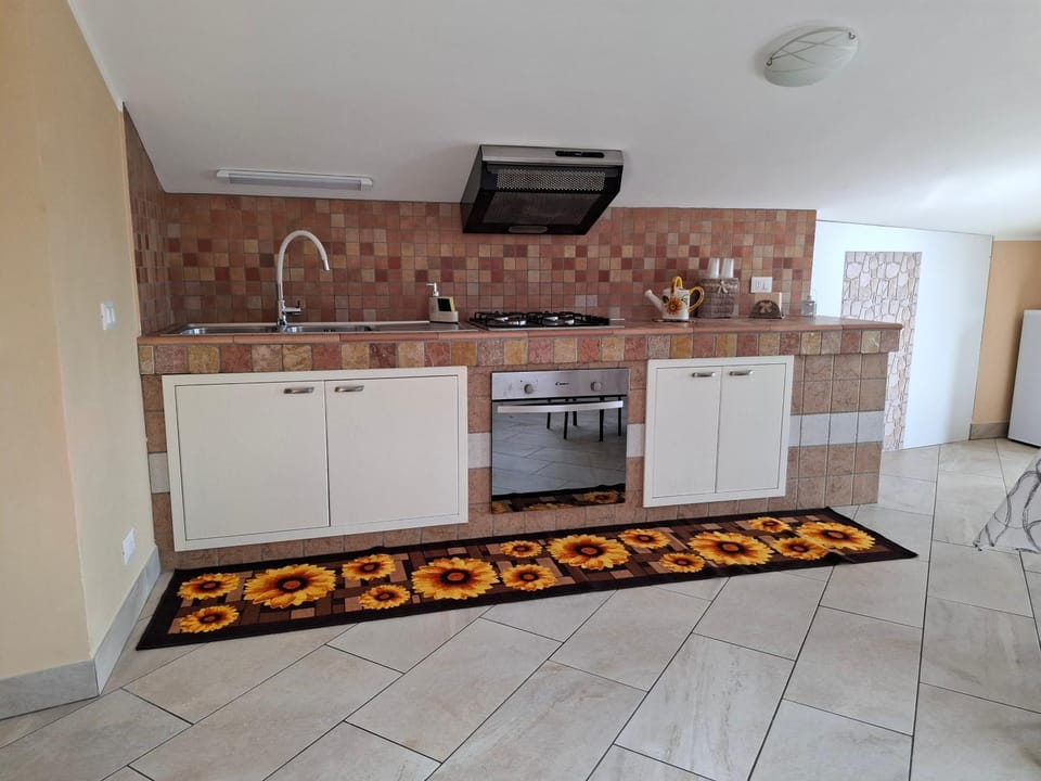 Kitchen or kitchenette, oven, stove