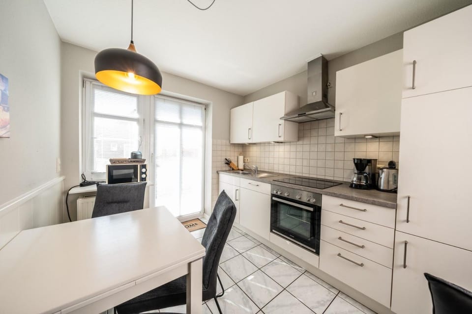 Kitchen or kitchenette, Dining area, dishwasher, oven, stove, toaster