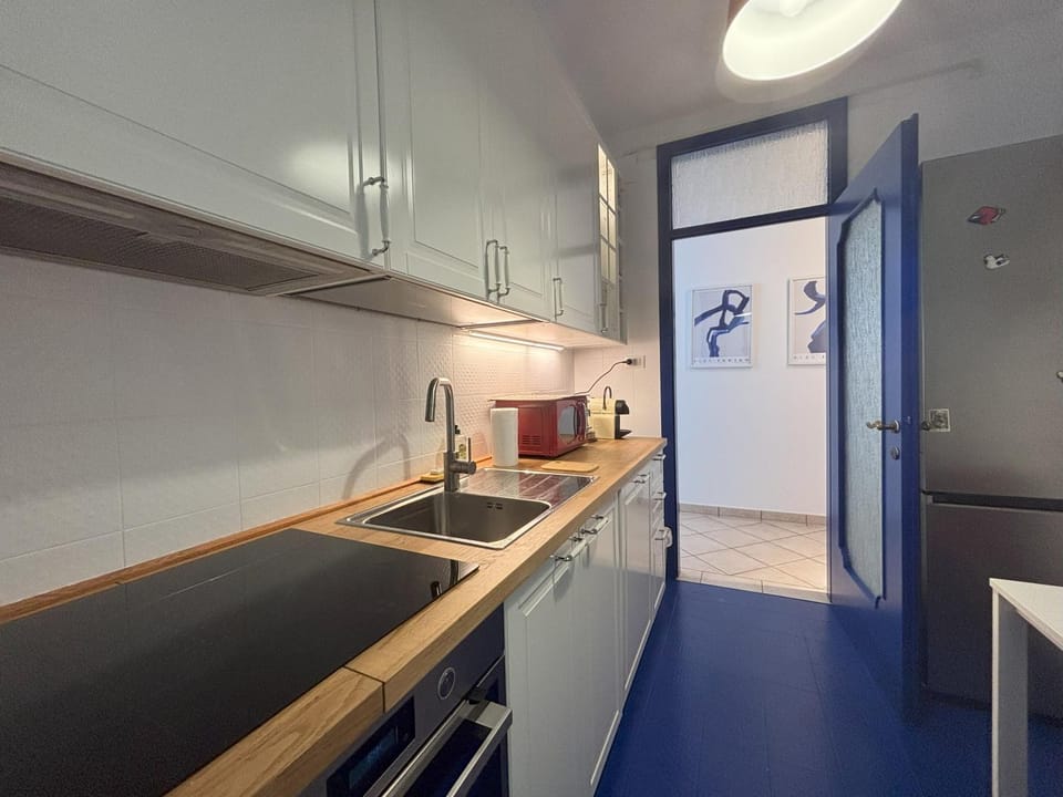 Kitchen or kitchenette, oven, stove