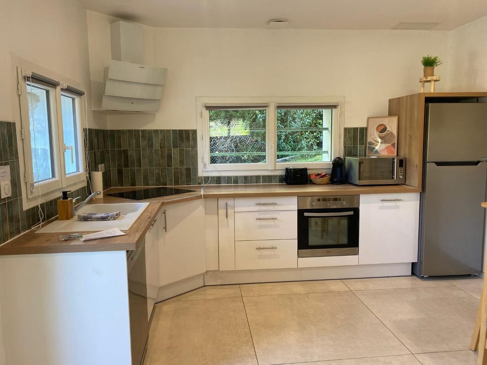 Kitchen or kitchenette, dishwasher, oven, stove, toaster