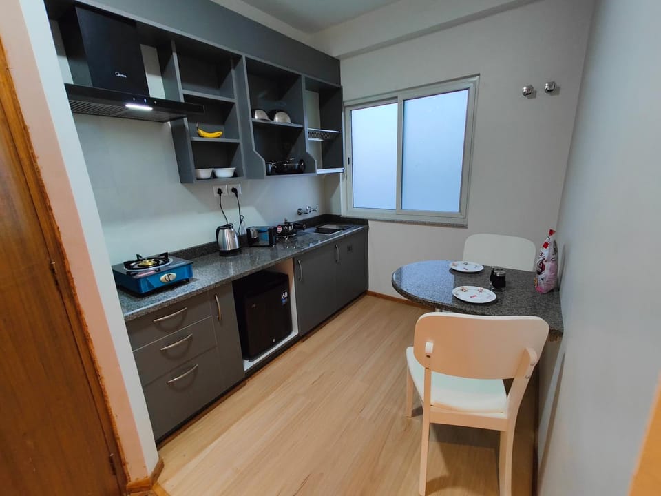 Kitchen or kitchenette, stove