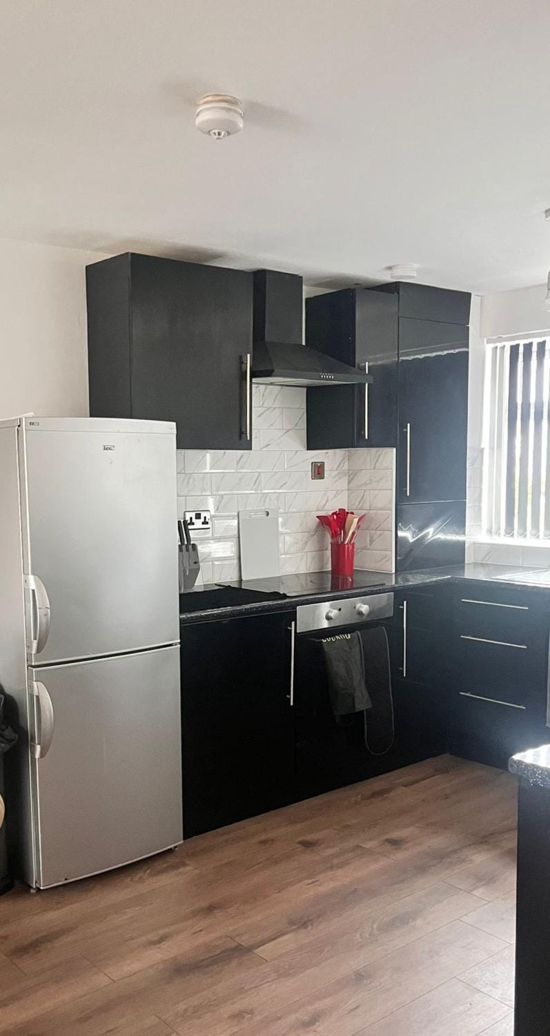 Kitchen or kitchenette, oven, stove, toaster