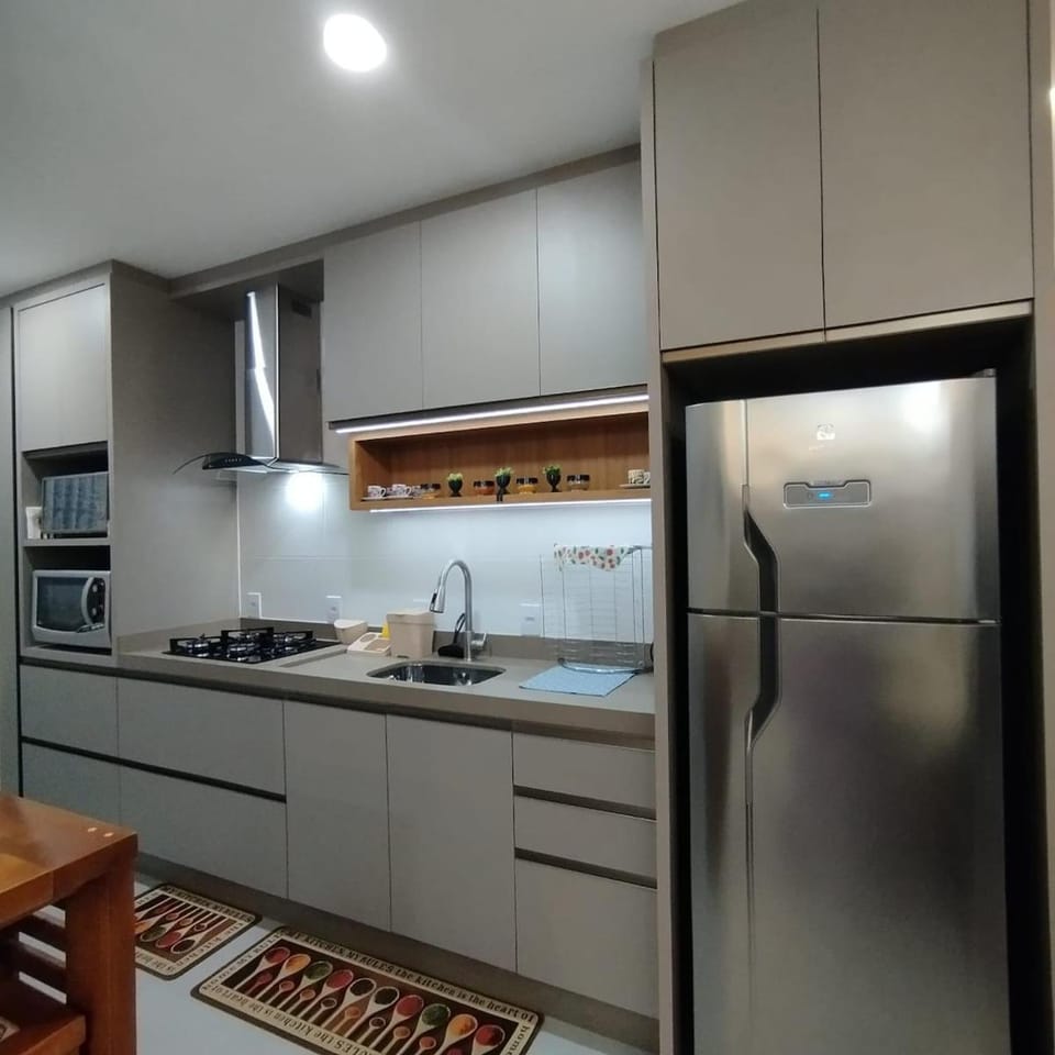 Kitchen or kitchenette, microwave, oven, stove, toaster