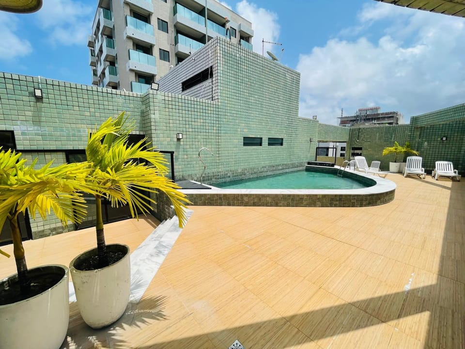 Property building, Day, Pool view, Swimming pool, sunbed