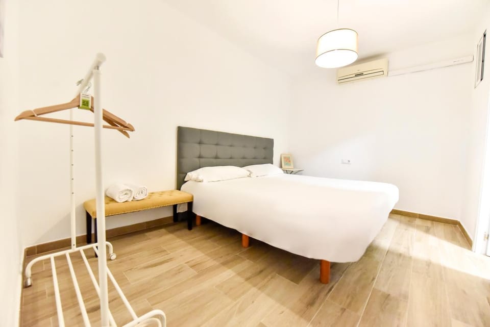 Bed, Photo of the whole room, Bedroom, towels, air conditioner