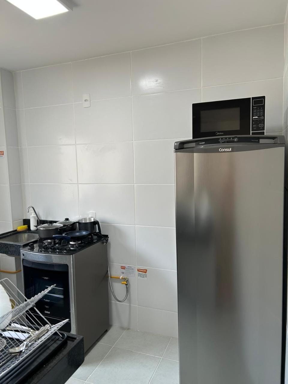 Kitchen or kitchenette, oven, stove