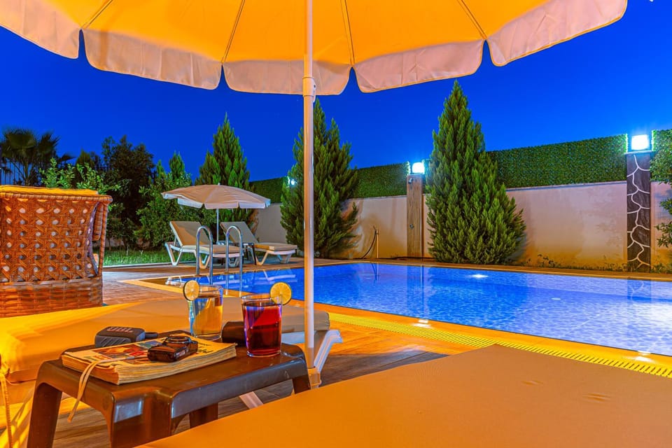 Patio, Night, Pool view, Swimming pool, Swimming pool, sunbed