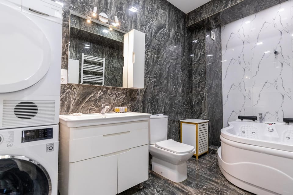 Shower, Toilet, Bathroom, Bath, towels, washing machine, dryer