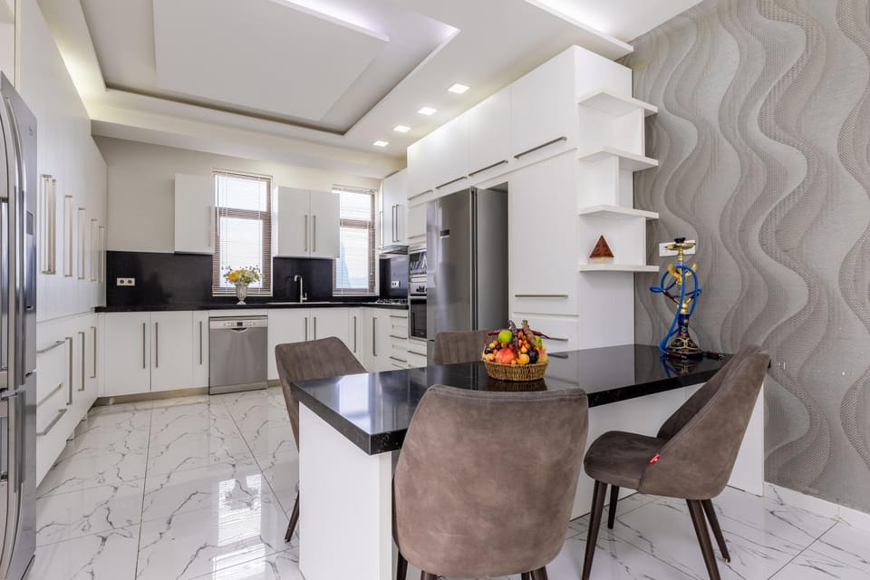 Kitchen or kitchenette, Living room, Seating area, Dining area, dishwasher, oven, stove