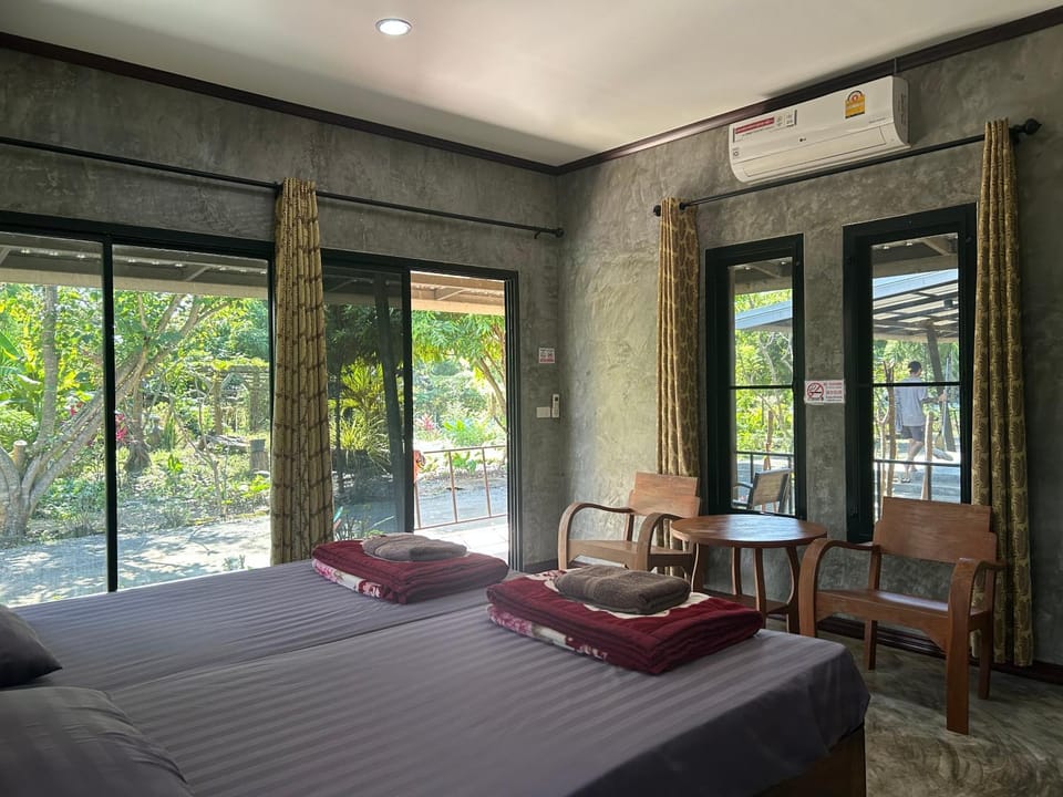 Bed, Photo of the whole room, Bedroom, towels, air conditioner