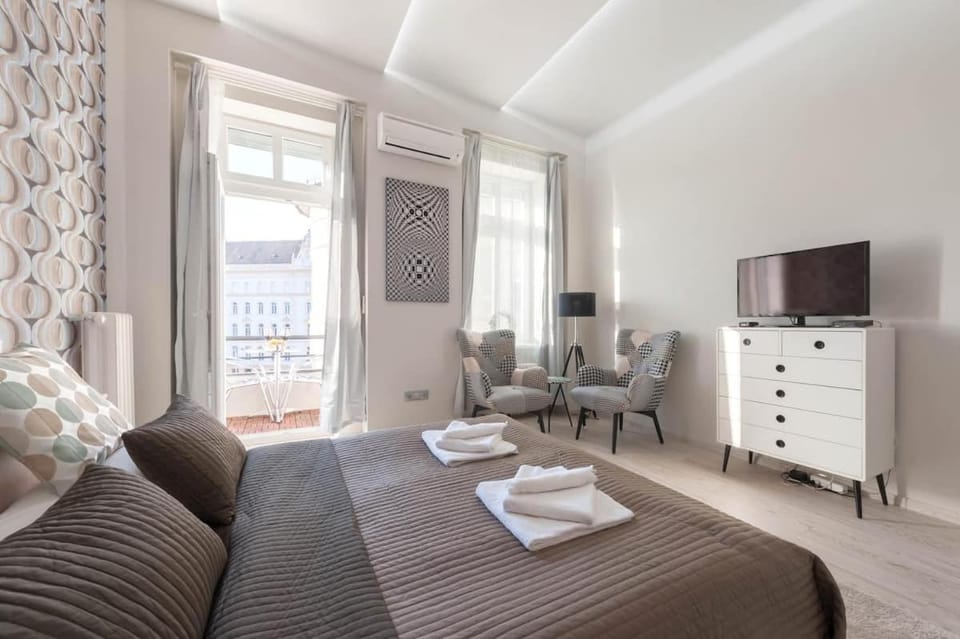 Basilica Home with design inspired by Vasarely and AC Apartment in Hungary