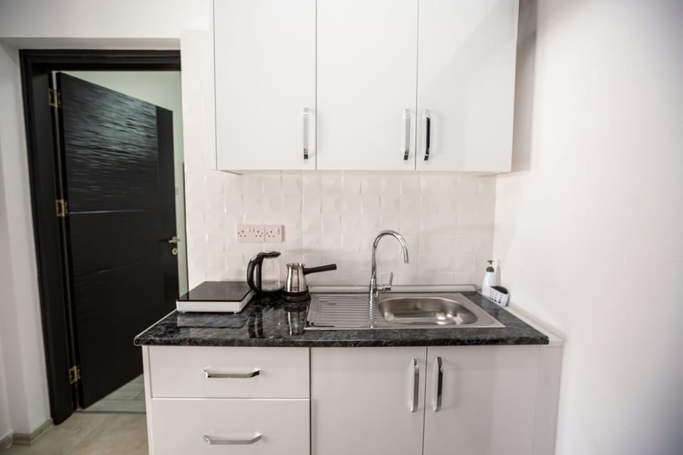 Kitchen or kitchenette, stove