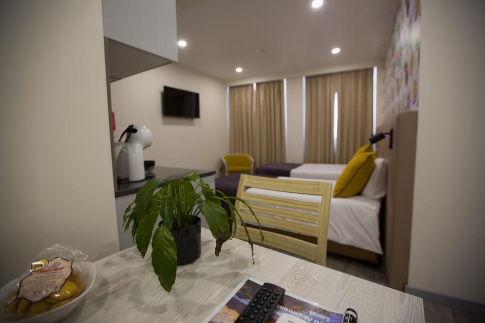 Bed, TV and multimedia, Living room, Seating area