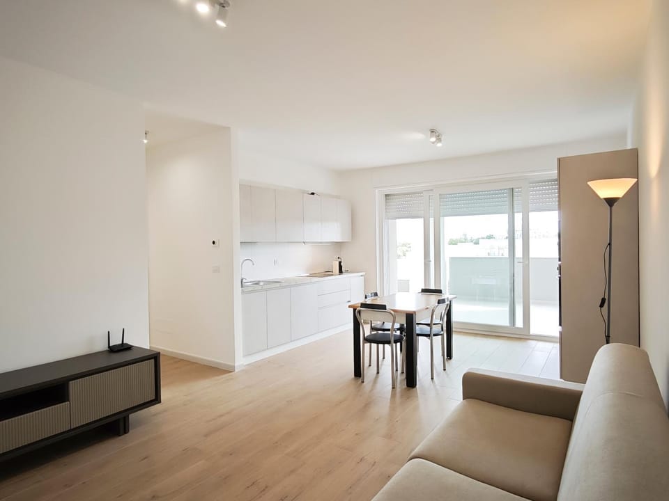 Kitchen or kitchenette, Living room, Seating area, Dining area