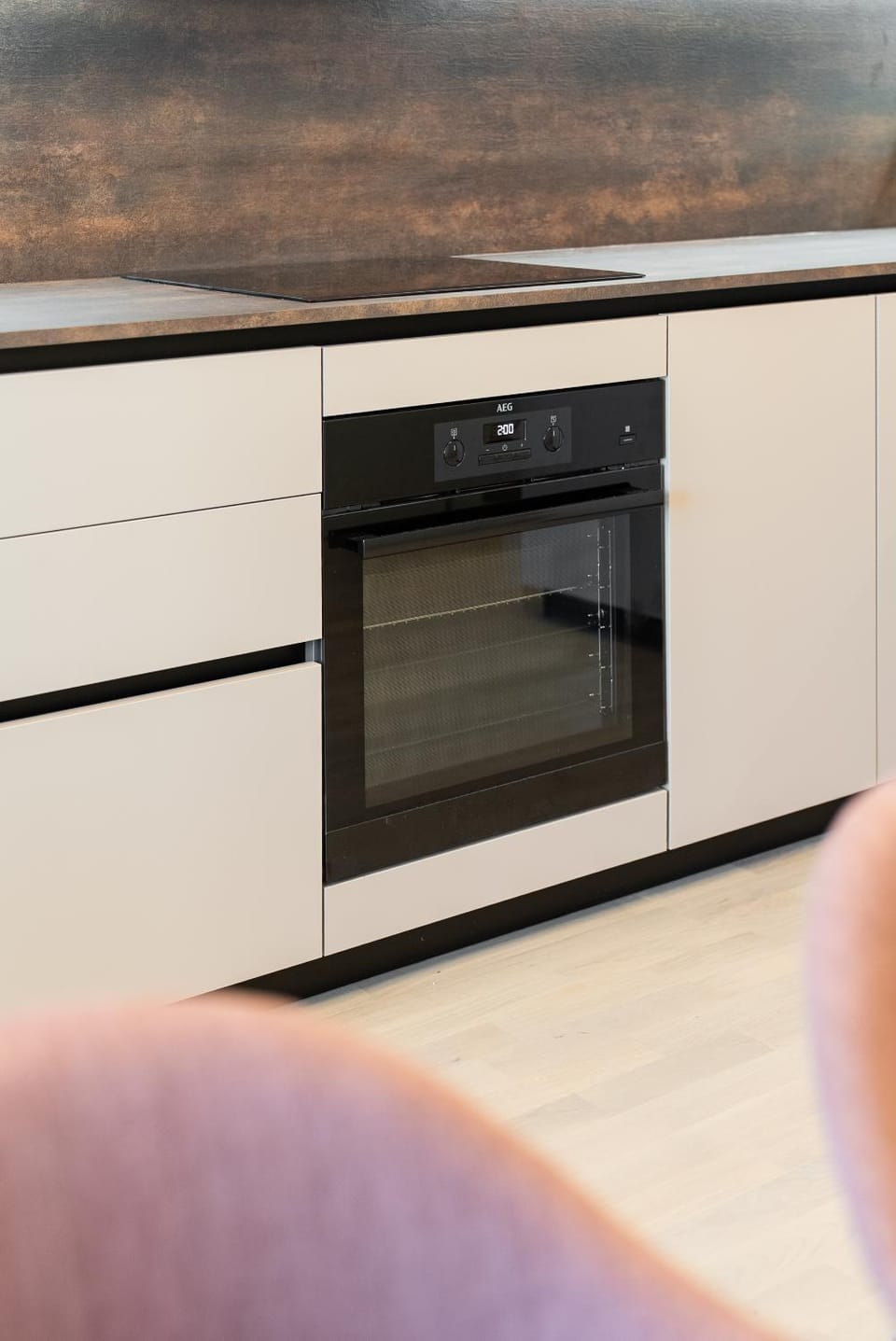 Kitchen or kitchenette, dishwasher, oven, stove