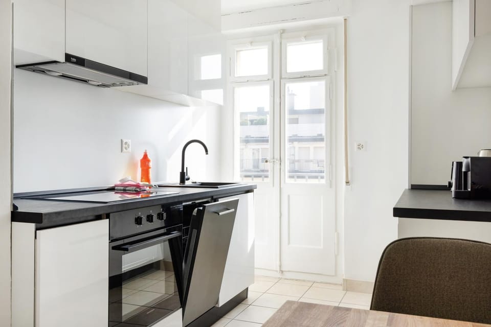 Kitchen or kitchenette, dishwasher, oven, stove, toaster