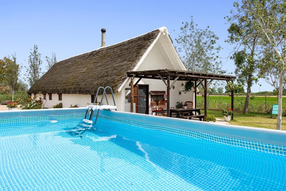 Property building, Living room, Swimming pool