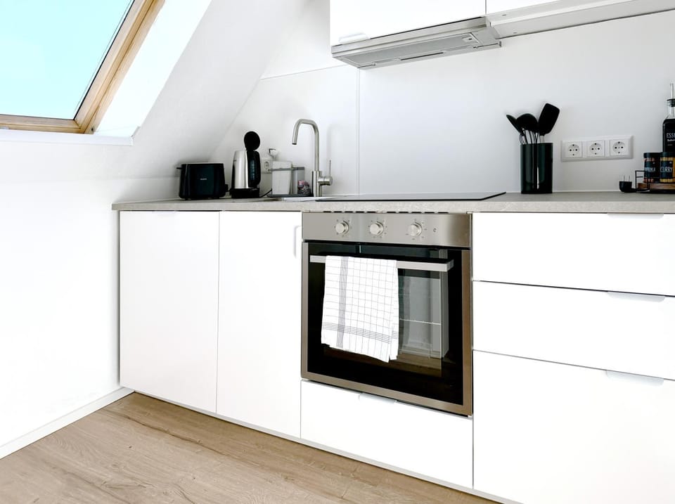Kitchen or kitchenette, stove, toaster