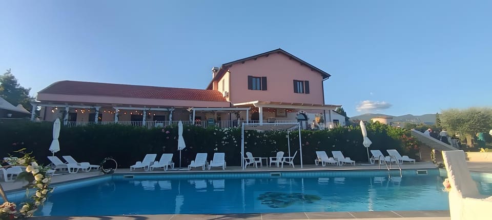 Property building, Living room, Swimming pool