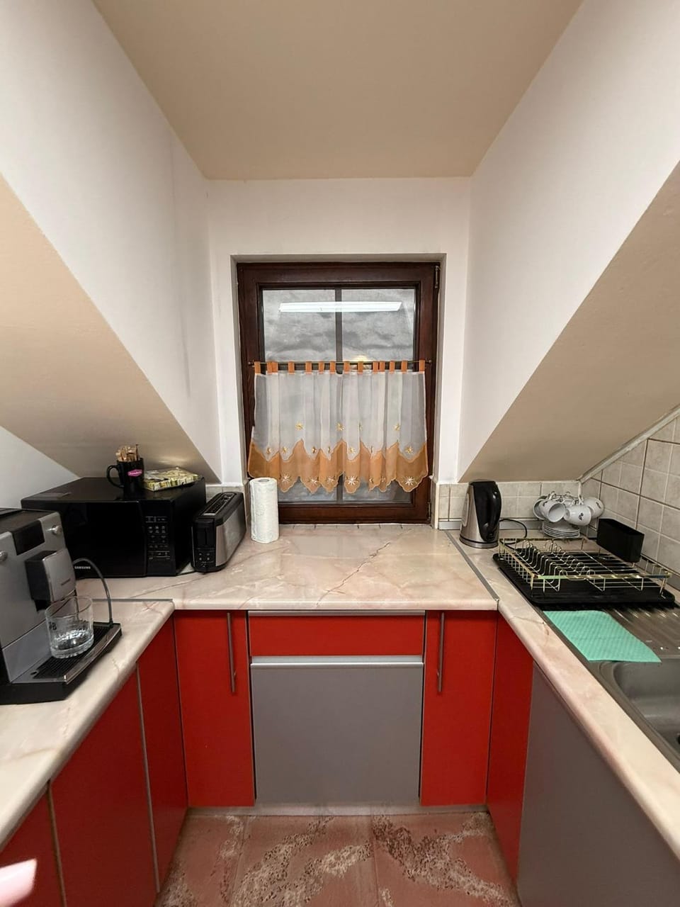 Kitchen or kitchenette, stove, toaster