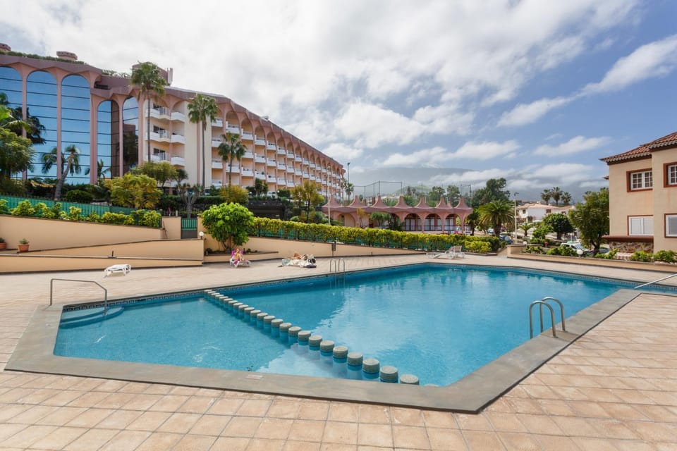 Property building, Living room, Swimming pool