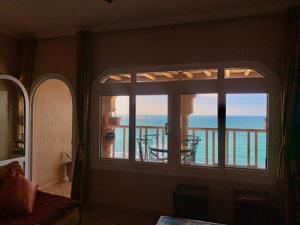 View (from property/room), Living room, Seating area, Sea view