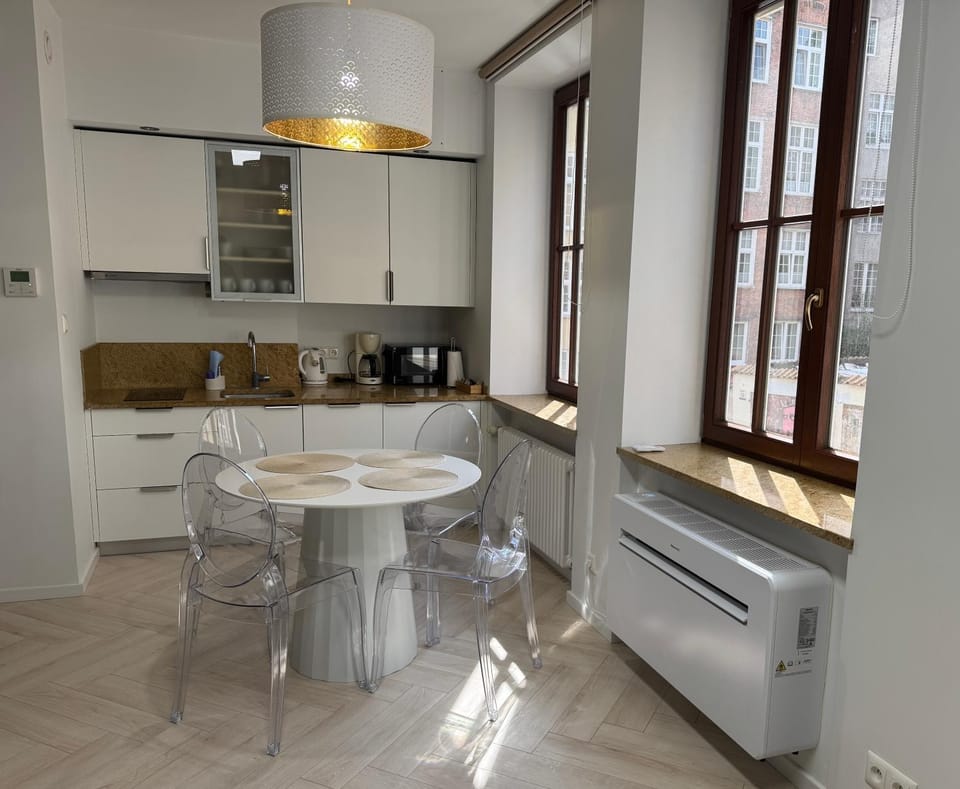 Kitchen or kitchenette, dishwasher, oven, air conditioner