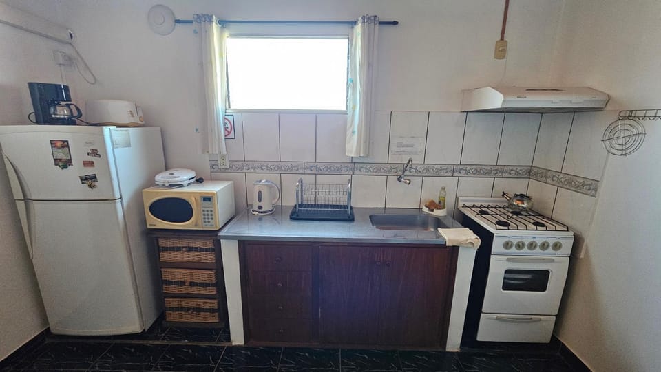 Kitchen or kitchenette, oven, stove