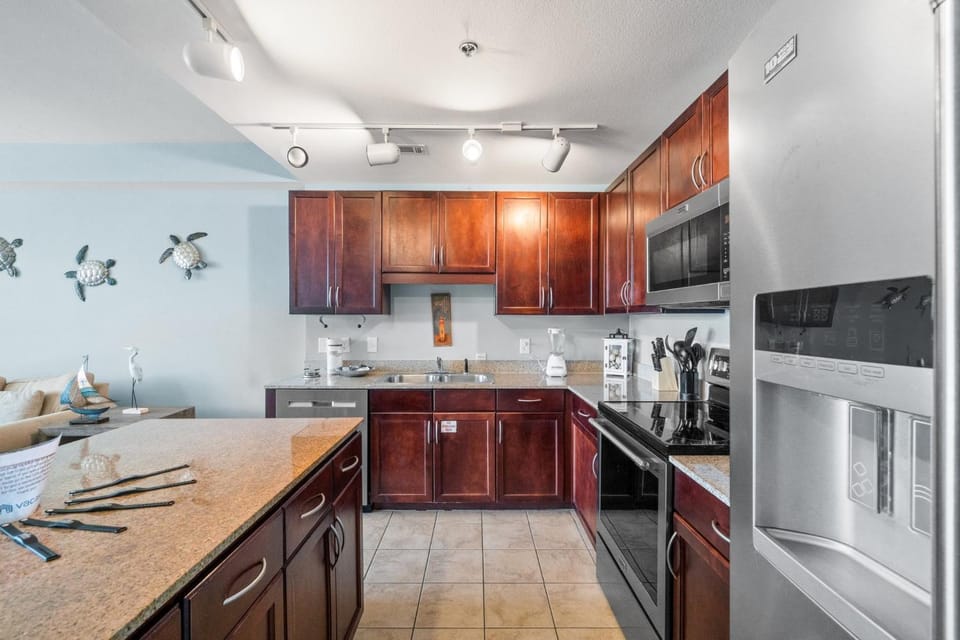 Kitchen or kitchenette, dishwasher, oven, stove, toaster