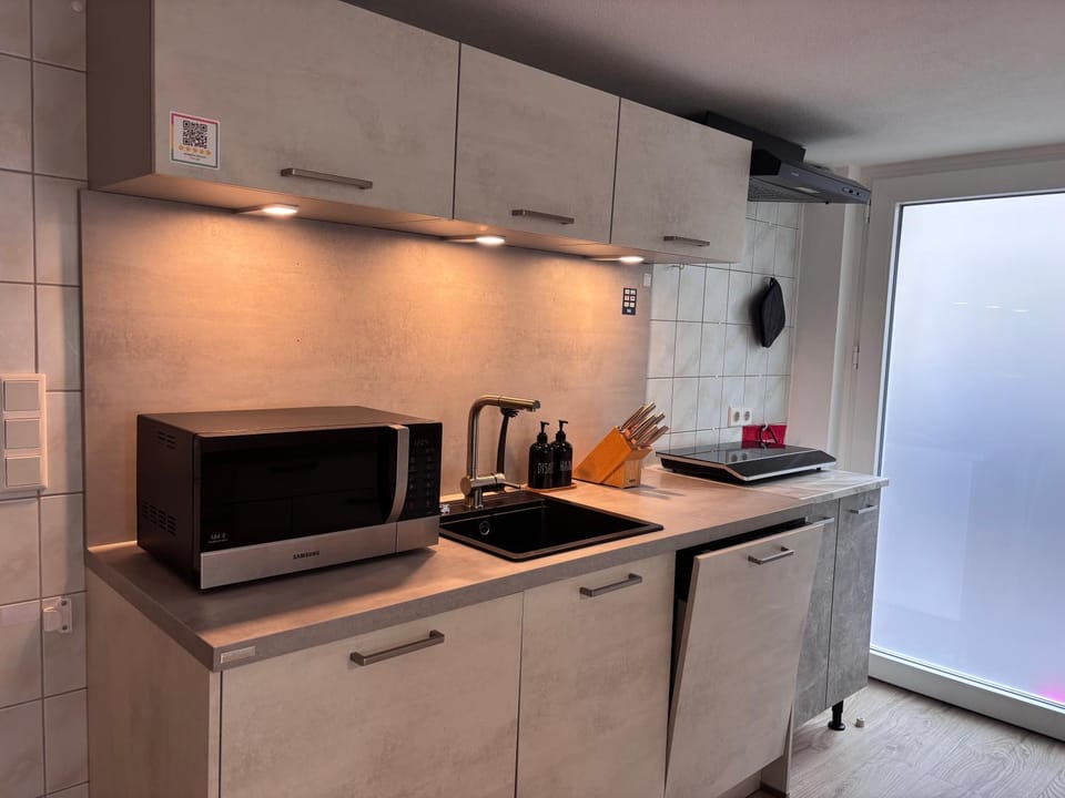 Kitchen or kitchenette, stove